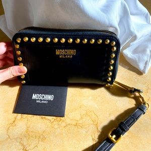 Moschino Studded Logo Wallet over the wrist